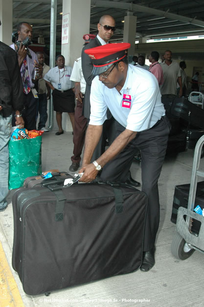 Minister of Tourism, Hon. Edmund Bartlett - Director of Tourism, Basil Smith, and Mayor of Montego Bay, Councillor Charles Sinclair Launch of Winter Tourism Season at Sangster International Airport, Saturday, December 15, 2007 - Sangster International Airport - MBJ Airports Limited, Montego Bay, Jamaica W.I. - Photographs by Net2Market.com - Barry J. Hough Sr, Photographer - Negril Travel Guide, Negril Jamaica WI - http://www.negriltravelguide.com - info@negriltravelguide.com...!