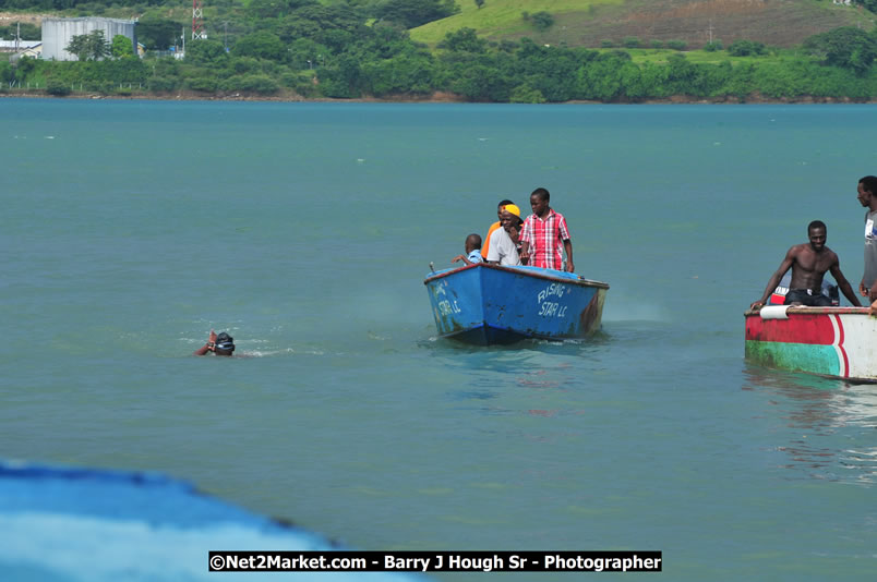 Lucea Cross the Harbour @ Lucea Car Park - All Day Event - Cross the Harbour Swim, Boat Rides, and Entertainment for the Family - Concert Featuring: Bushman, George Nooksl, Little Hero, Bushi One String, Dog Rice and many local Artists - Friday, August 1, 2008 - Lucea, Hanover Jamaica - Photographs by Net2Market.com - Barry J. Hough Sr. Photojournalist/Photograper - Photographs taken with a Nikon D300 - Negril Travel Guide, Negril Jamaica WI - http://www.negriltravelguide.com - info@negriltravelguide.com...!