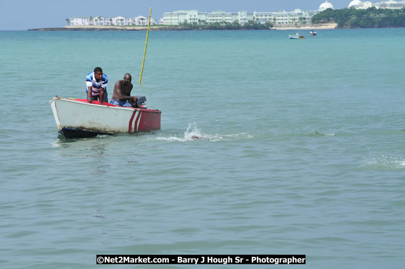 Lucea Cross the Harbour @ Lucea Car Park - All Day Event - Cross the Harbour Swim, Boat Rides, and Entertainment for the Family - Concert Featuring: Bushman, George Nooksl, Little Hero, Bushi One String, Dog Rice and many local Artists - Friday, August 1, 2008 - Lucea, Hanover Jamaica - Photographs by Net2Market.com - Barry J. Hough Sr. Photojournalist/Photograper - Photographs taken with a Nikon D300 - Negril Travel Guide, Negril Jamaica WI - http://www.negriltravelguide.com - info@negriltravelguide.com...!