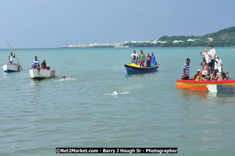 Lucea Cross the Harbour @ Lucea Car Park - All Day Event - Cross the Harbour Swim, Boat Rides, and Entertainment for the Family - Concert Featuring: Bushman, George Nooksl, Little Hero, Bushi One String, Dog Rice and many local Artists - Friday, August 1, 2008 - Lucea, Hanover Jamaica - Photographs by Net2Market.com - Barry J. Hough Sr. Photojournalist/Photograper - Photographs taken with a Nikon D300 - Negril Travel Guide, Negril Jamaica WI - http://www.negriltravelguide.com - info@negriltravelguide.com...!