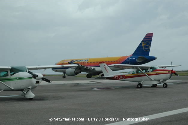 Air Jamaica Airline - Landing & Take Off - MBJ Airports Limited - Sangster International Airport - Domestic Terminal - Montego Bay, St James, Jamaica W.I. - MBJ Limited - Transforming Sangster International Airport into a world class facility - Photographs by Net2Market.com - Negril Travel Guide, Negril Jamaica WI - http://www.negriltravelguide.com - info@negriltravelguide.com...!