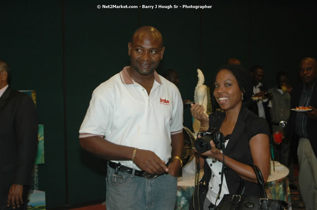 Red Cap Porters Awards - Minister of Tourism, Hon. Edmund Bartlett - Director of Tourism, Basil Smith - Friday, December 14, 2007 - Holiday Inn Sunspree, Montego Bay, Jamaica W.I. - Photographs by Net2Market.com - Barry J. Hough Sr, Photographer - Negril Travel Guide, Negril Jamaica WI - http://www.negriltravelguide.com - info@negriltravelguide.com...!