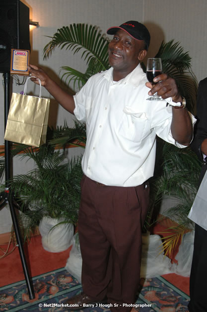 Red Cap Porters Awards - Minister of Tourism, Hon. Edmund Bartlett - Director of Tourism, Basil Smith - Friday, December 14, 2007 - Holiday Inn Sunspree, Montego Bay, Jamaica W.I. - Photographs by Net2Market.com - Barry J. Hough Sr, Photographer - Negril Travel Guide, Negril Jamaica WI - http://www.negriltravelguide.com - info@negriltravelguide.com...!